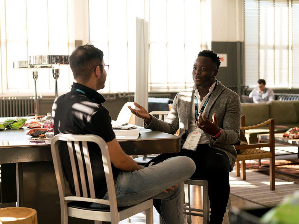 Photo-of-Men-Having-Conversation